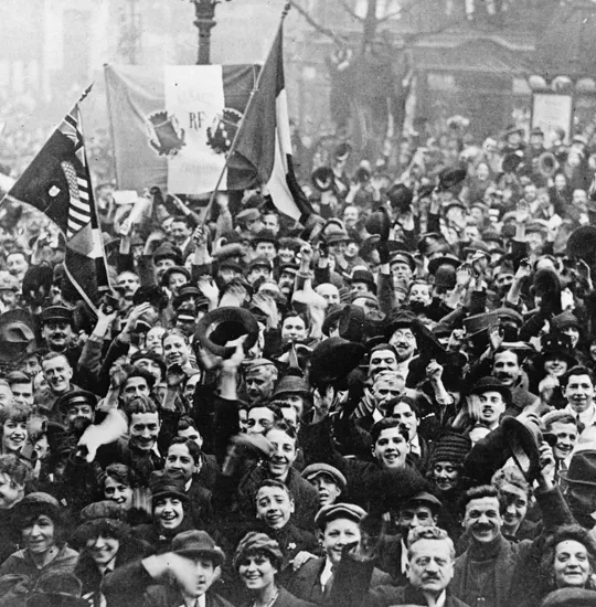 Cheering crowds in Paris, 11 November 1918.