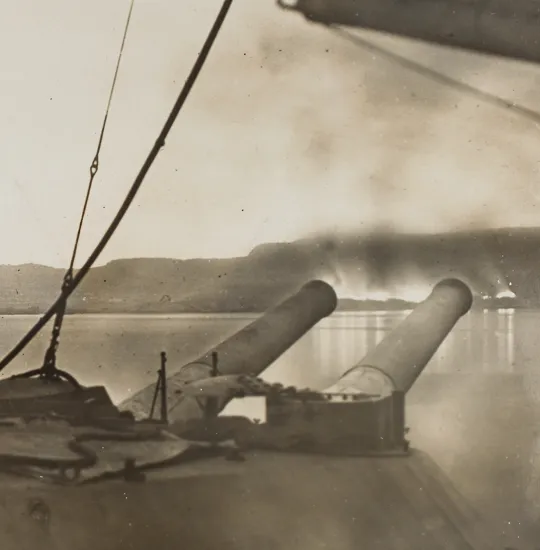 HMS Cornwallis firing on New Zealand stores after evacuating Gallipoli, 8 December 1916.