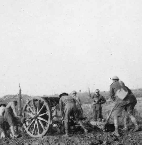 Gun crew in the mud at Passchendaele, Belgium, circa 1917.