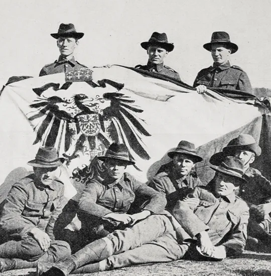 The first German flag to be hauled down after the landing of the New Zealand troops at Apia, 29 August 1914.