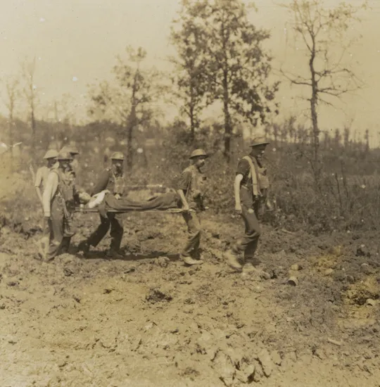 Stretcher bearers in Ploegsteert Wood, Belgium, 25 August 1917.