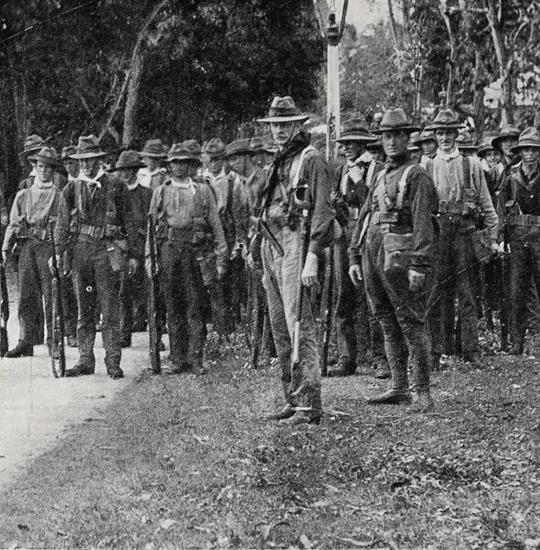 Members of the 3rd Auckland Regiment in Apia after the surrender of the town.