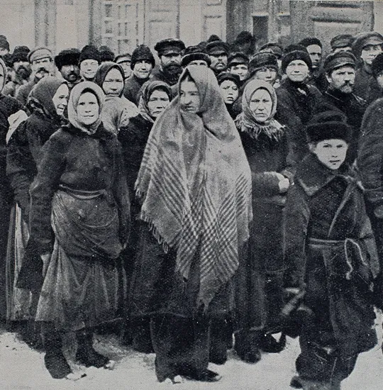 Polish civilians waiting for food distribution by the authorities.